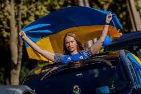 Ukrainian citizens in Chile protest outside the Russian Embassy